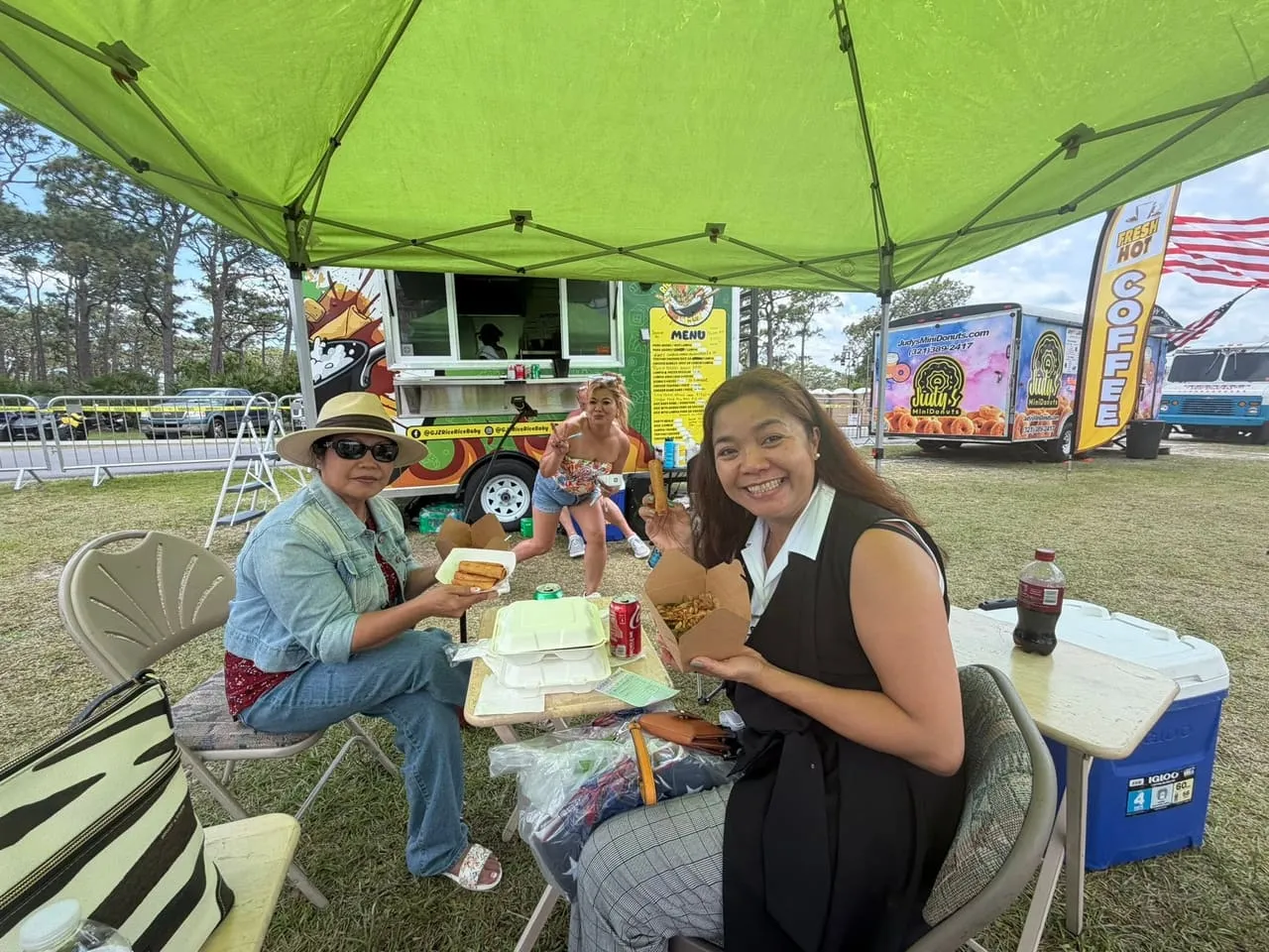 SCFACC members enjoying food from the Rice Rice Baby food truck at the All Veterans Reunion.